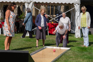 images of Richmond Charities' residents enjoying their summer garden party at Hickey's Almshouses