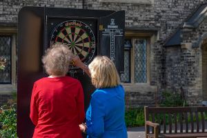 images of Richmond Charities' residents enjoying their summer garden party at Hickey's Almshouses