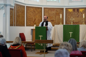 Photos of residents enjoying The Richmond Charities' annual service of Thanksgiving held in the Chapel at Hickey's Almshouses